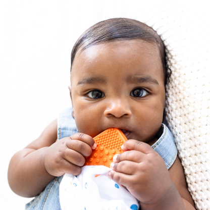 Papaya Chill Toothi teether – Colorful teething relief.