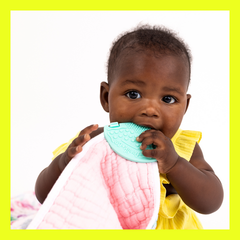 Baby with blue Toothy Teether