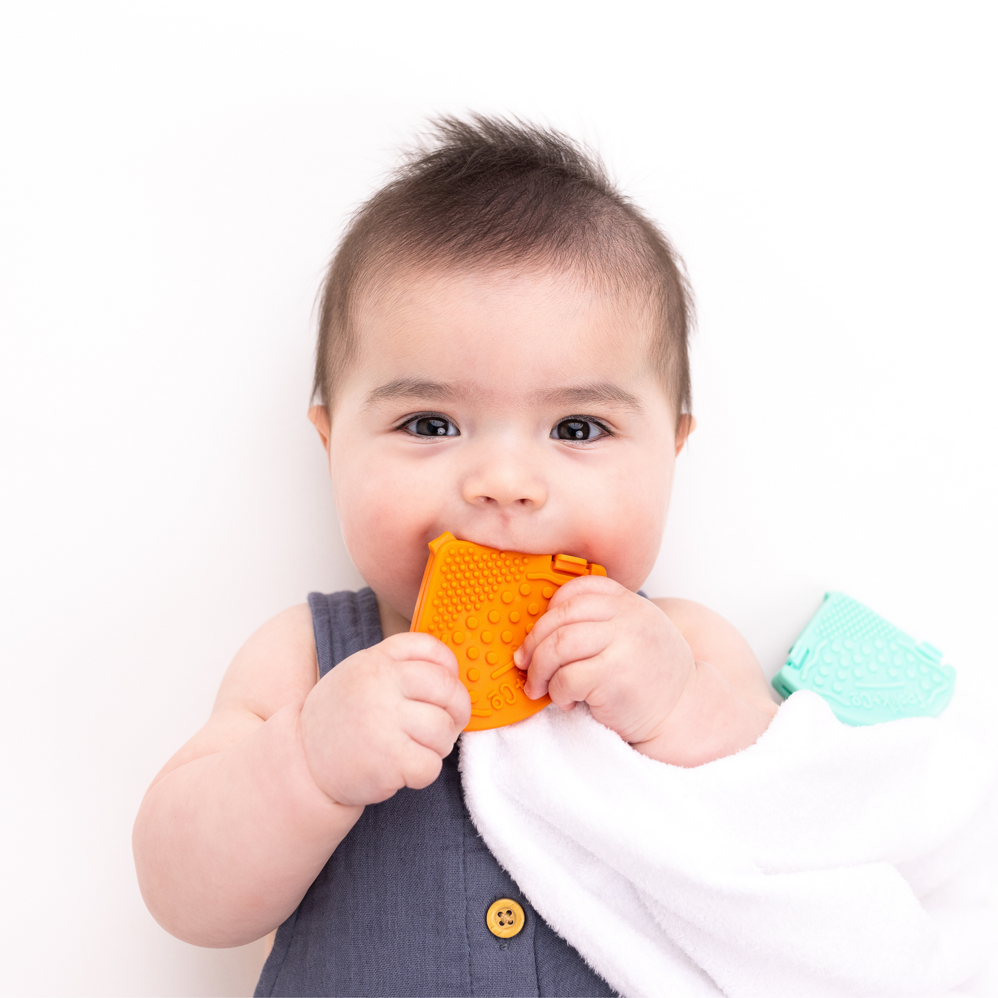 Papaya Chill Toothi teether – Soft and soothing relief.