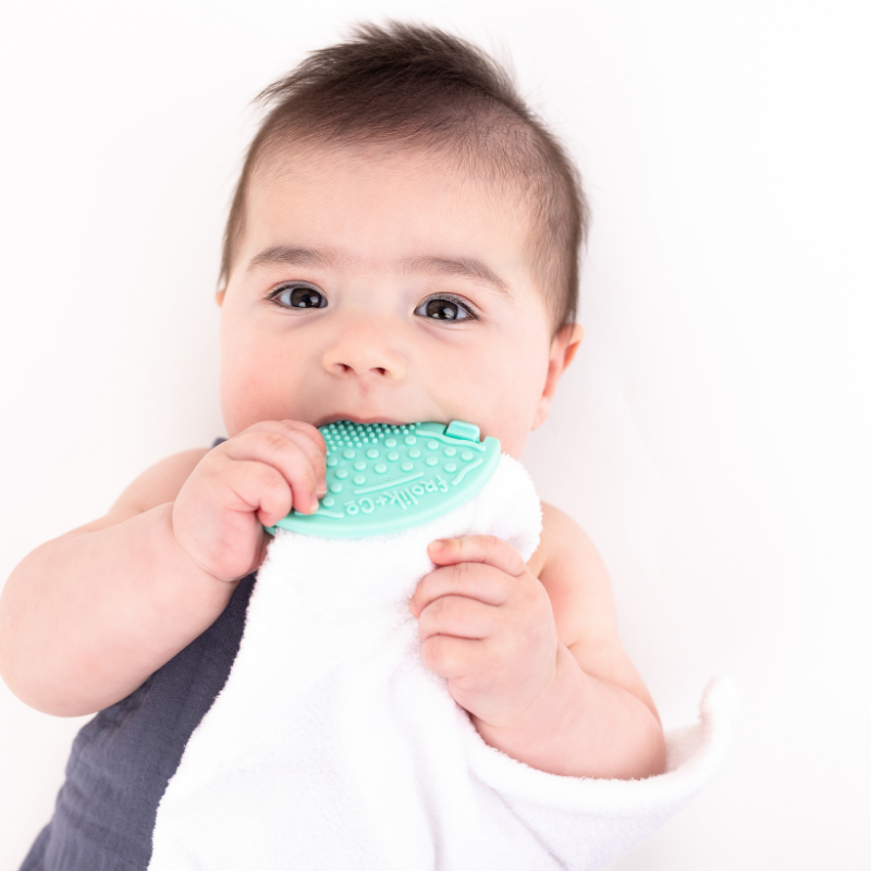 Toothi clips to almost any textile, giving baby custom teething and supporting your day!