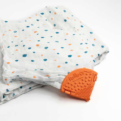 Papaya Chill Toothi teether – Bright, calming teething relief.